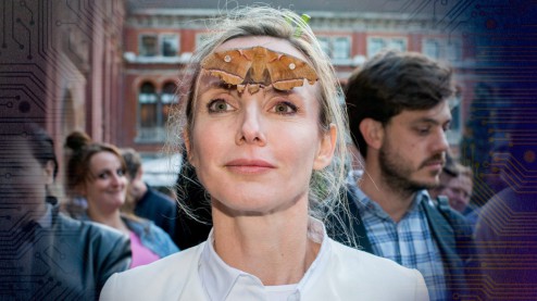 Natalie Jeremijenko interacting with a moth.  